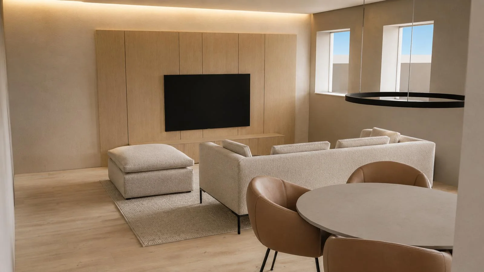 Salon contemporain avec mobilier clair dans un appartement T4 rénové à Annecy-le-Vieux